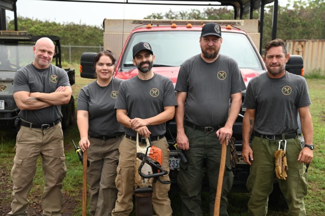 Half of the U.S. Army Garrison Hawai&#39;i Wildland Fire Team, showcasing their commitment to battling wildfires and ensuring safety at Army installations. This photo captures five members of the ten-strong team, exemplifying their specialized...