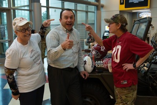 Big Al visits with U.S. Army Security Assistance Command team members during a November 2023 visit to their Redstone Arsenal headquarter building. Big Al is the costumed elephant mascot of the University of Alabama Crimson Tide in Tuscaloosa,...