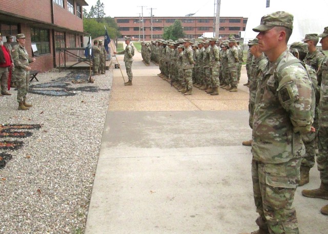 Capt. Marianne Rose, Fort Leonard Wood Blood Donor Center chief, explains to Soldiers with Company D, 2nd Battalion, 10th Infantry Regiment, how important their 100-Donor Club membership is to Army readiness during their “Giving 4 Living”...