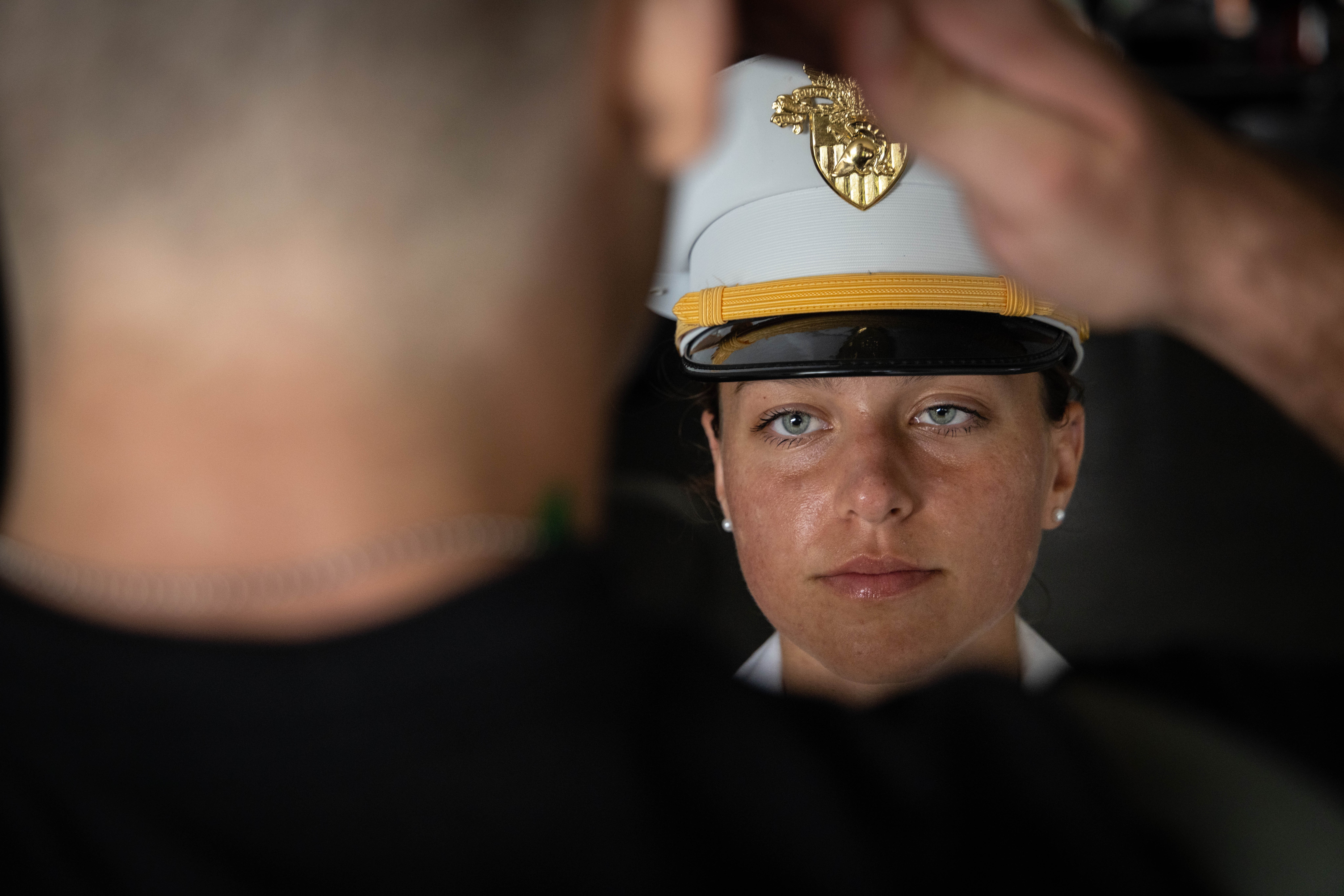 Reporting to the Cadet in the Red Sash