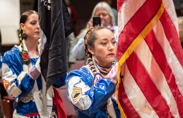 Keshon Smith, right, a member of the Native American Women Warriors and Army veteran carries the U.S. flag while Carrie Lewis, also an NAWW member and a Marine Corps veteran, holds the POW-MIA flag during the National American Indian Heritage Month observance at Redstone Arsenal, Alabama, on Nov. 13, 2019. 

Smith survived an improvised explosive device attack during a deployment to Iraq in November 2004 and battled post traumatic stress disorder and traumatic brain injury throughout her career.

She said joining the Native American Women Warriors organization helped her gain the strength to seek medical help. She is now the NAWW president. 

The NAWW are an all-female group of Native American veterans who started as a color guard but have since grown and branched out as advocates for Native American women veterans in areas such as health, education and employment. The members make appearances at various events around the country, serving as motivational and keynote speakers, performing tribal dances, and fulfilling the role of color guard representing all branches of the U.S. military.