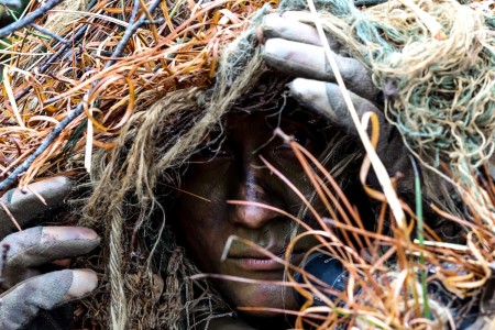 A Soldier from Sniper School Class 23-002 participates in stalk training January 2, 2023, at Fort Benning, Georgia.