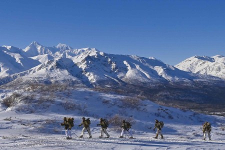 Soldiers conduct avalanche safety training during a cold weather leader course at the Black Rapids Training Site in Alaska, Feb. 27, 2023.