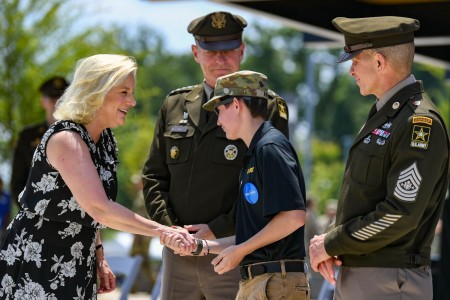 Make-A-Wish recipient Myles Avery is honored by U.S. Army senior leaders for becoming a soldier for a day during the Army Birthday Festival Ceremony at the National Museum of the United States Army, Fort Belvoir, Va., June 10, 2023. The event commemorated the 248th Birthday of the U.S. Army. 