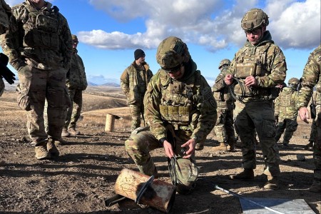 Spc. Maitlan G. Cherry and Spc. Micheal L. Holland demonstrate explosive tools techniques on metal to simulate ordnance during counter advanced Improvised Explosive Device training on Yakima Training Center, Washington.  The U.S. Army 53rd Ordnance Company (EOD) hosted the joint, multicomponent and interagency counter IED training with the Washington National Guard 319th EOD Company, Oregon National Guard 142nd Flight Wing Civil Engineer Squadron, U.S. Air Force 92nd Civilian Engineer Squadron and U.S. Navy EOD Mobile Unit 11 Detachment Northwest.