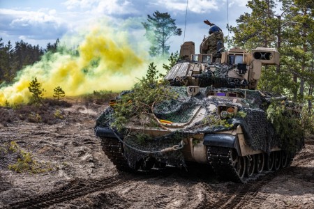 U.S. Soldiers assigned to the 2nd Armored Brigade Combat Team, 1st Cavalry Division supporting the 4th Infantry Division maneuver an M2 Bradley Fighting Vehicle during exercise Arrow 23 in Niinisalo, Finland, May 5, 2023. Exercise Arrow is an annual, multinational exercise involving armed forces from the U.S., U.K., Latvia, Lithuania and Estonia, who train with the Finnish Defense Forces in high-intensity, force-on-force engagements and live fire exercises to increase military readiness and promote interoperability among partner nations.