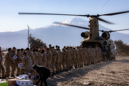U.S. Army CH-47F Chinook assigned to 3rd Battalion, 501st Aviation Regiment, Combat Aviation Brigade, 1st Armored Division, continues to deliver relief supplies to Turkish authorities in Samandang, Türkiye, Feb. 17, 2023.