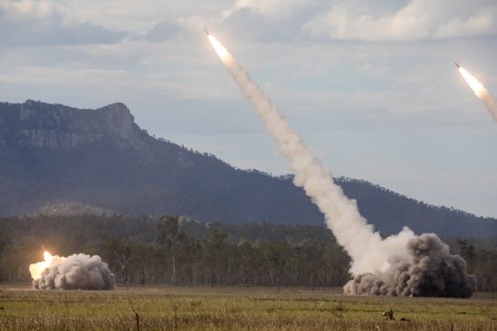 Soldiers fire three M142 HIMARS rockets during a combined joint live fire demonstration at Shoalwater Bay Training Area, Queensland, Australia, July 22, 2023. The demonstration launched Talisman Sabre, the largest bilateral military exercise between the U.S. and Australia.