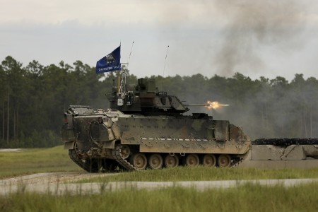 An M2A4 Bradley Fighting Vehicle, assigned to 2nd Battalion, 7th Infantry Regiment, 1st Armored Brigade Combat Team, 3rd Infantry Division, fires down range during a Table VI live-fire exercise at Fort Stewart, Georgia, Sept. 8, 2023. The Table VI gunnery is used to evaluate crews&#39; abilities to engage moving and stationary targets. 3rd ID is leading the effort in modernizing the Army&#39;s armored brigade combat teams for large scale combat operations, making America&#39;s forces more connected and lethal than ever before. 