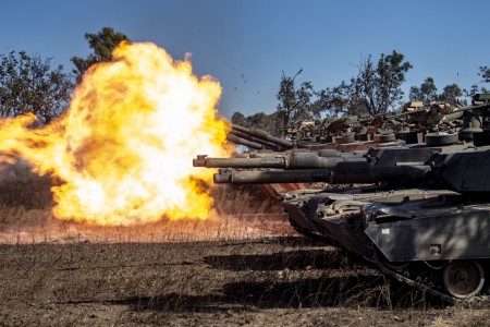 An armored crew from Comanche Company, 4th Battalion, 6th infantry Regiment, fires an M1A2 Abrams tank during a Live Fire Accuracy Screening Test at the Townsville Field Training Area in Queensland, Australia, August 4, 2023. Comanche Company and units from the Australian Army’s 3rd Brigade are preparing to participate in a combined arms live fire exercise.