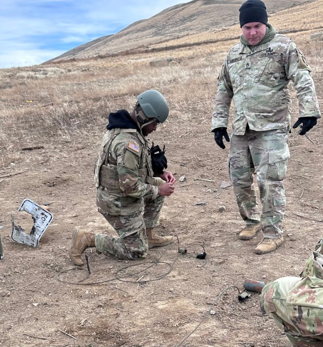 Staff Sgt. Derek W. Lieding (right) and Spc. Brandon J. Gonzalez (left)