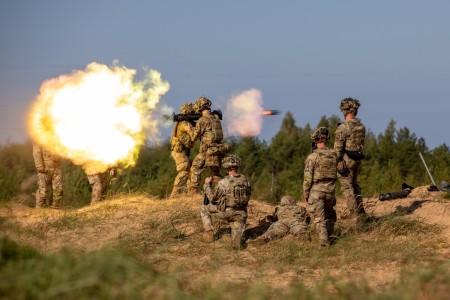 Soldiers fire an M4 weapon during Silver Arrow, a live fire training event, at Camp Adazi, Latvia, Sept. 17, 2023. 