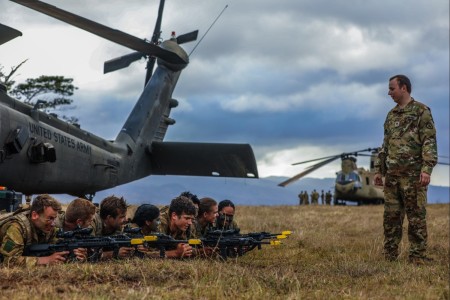 New Zealand Army gunners assigned to 163rd Battery, 16th Field Regiment Royal Regiment of New Zealand Artillery (RNZA) practice sling load training with the 25th Combat Aviation Brigade, 25th Infantry Division in Helemano Military Reservation, Hawaii on Nov. 7, 2023. The Joint Pacific Multinational Readiness Center (JPMRC) is the Army’s newest Combat Training Center (CTC) and generates readiness in the environments and conditions where our forces are most likely to operate in. JPMRC 24-01 includes over 5,300 training participants from across the U.S. Joint Force, New Zealand, the United Kingdom, Indonesia, and Thailand.