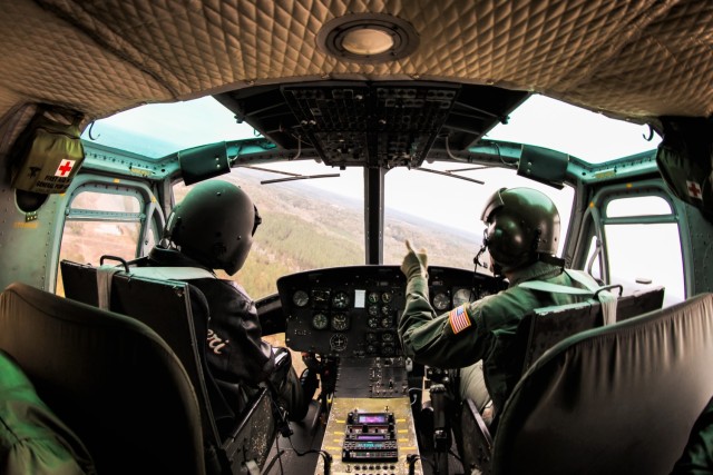 Friends of Army Aviation volunteer pilots fly recent Fort Novosel graduates and their families during grad ride in Ozark, Ala. on Nov. 30, 2023.