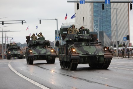 U.S. Army M2 Bradley Fighting vehicles from 3rd Battalion, 67th Armored Regiment, 2nd Armored Brigade Combat Team, 3rd Infantry Division parade through the streets of Vilnius, Lithuania, Nov. 25, 2023. Elements from 1st Battalion, 9th Field Artillery and 3rd Battalion, 67th Armored Regiment participated in the Lithuanian Armed Forces Day Parade alongside their NATO Allies. The 3rd Infantry Division’s mission in Europe is to engage in multinational training and exercises across the continent, working alongside NATO allies and regional security partners to provide combat-credible forces to V Corps, America’s forward deployed corps in Europe. 