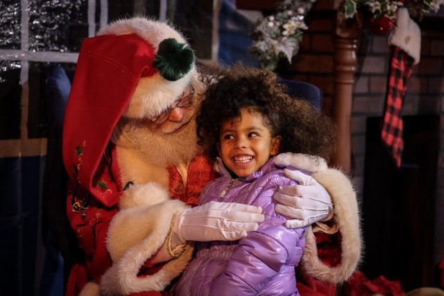 Santa speaks to a youth Thursday, Nov. 30, 2023 at the Fort Gregg-Adams Grand Illumination.
