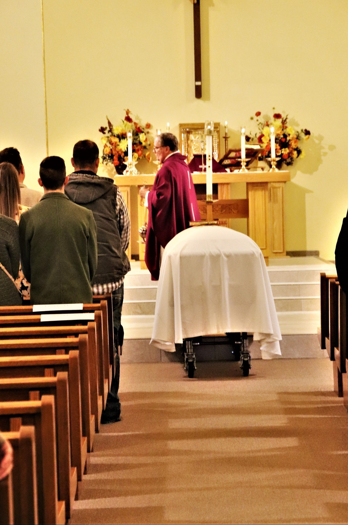 A funeral mass is shown at Sacred Heart Catholic Church for Pfc. Charles Dickman on Oct. 21, 2023, in Cashton, Wis. Pfc. Charles Dickman was only 17 years old when he died fighting in the Korean War on July 12, 1950, as a heavy weapons infantryman...