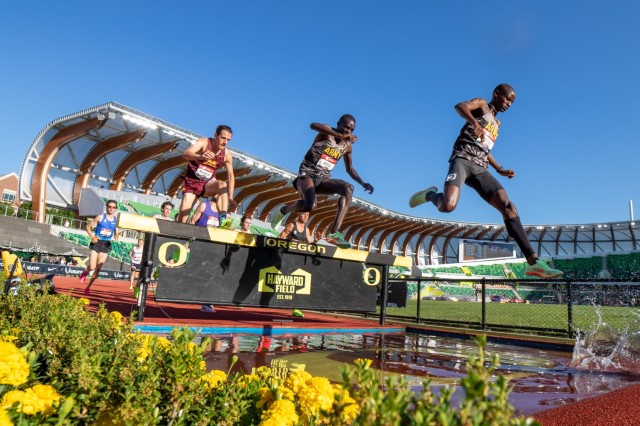 Spc. Benard Keter (front), Sgt. Anthony Rotich (middle) complete the water jump during the Men&#39;s 3,000m steeplechase preliminary round at the 2023 USA Track and Field Outdoor Championships held in Eugene, Oregon, July 6, 20...