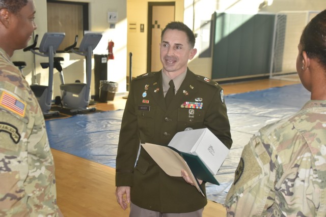 2nd Lt. Michael Moser, center, speaks with fellow signal colleagues following his graduation from the Signal Basic Officer Leader Course (Class 006-23) on Oct. 4. Moser earned the Charles Kilbourne Leadership Award for outstanding leadership and...