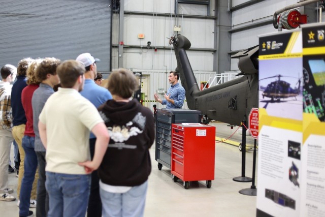 PIF team member Burns Accardi speaks to a group of visting students during Adventures in Engineering Day.