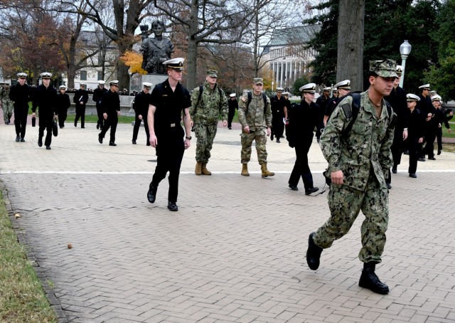 A U.S. Military Academy cadet walks to the U.S. Naval Academy dining facility Dec. 1. He participated in the semester-long service academy exchange program and will be one of seven West Point students exchanged at midfield prior to the Army-Navy game Dec. 9.