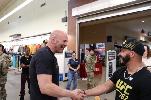UFC President Dana White shakes hands with retired Sgt. Osvaldo Gierbolini during a meet and greet event Nov. 30 at the Fort Cavazos Main Exchange. (U.S. Army photo by Shawn Davis, Fort Cavazos Public Affairs)