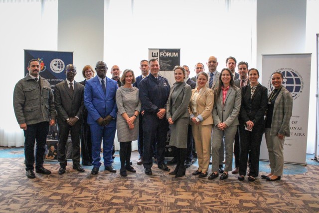 National Defense University College of International Security Affairs leaders and students gather for a group photo with Lt. Gen. Dagvin RM Anderson, director for Joint Force Development, Joint Staff, at the Irregular Warfare Forum in Arlington,...