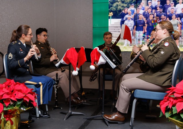 Members of the U.S. Army Japan band perform during a holiday reception inside the Camp Zama Community Club at Camp Zama, Japan, Dec. 8, 2023. More than 160 local community leaders and Camp Zama personnel came together for the festive event.