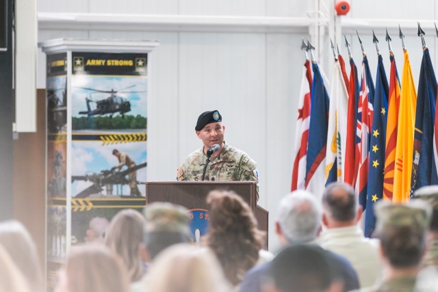 Outgoing Command Sgt. Maj. Christopher T. Doss speaks to the crowd at the change of responsibility ceremony inside the Army Aviation Museum on Dec. 12.