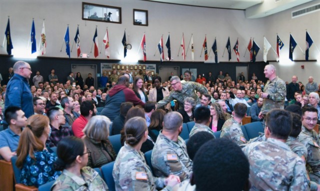GEN James E. Rainey, commanding general of U.S. Army Futures Command (AFC), shakes hands with civilian employees at a town hall during a visit to DEVCOM Soldier Center in Natick, Massachusetts on Nov 7, 2023.