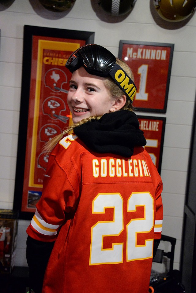 Thirteen-year-old Madison Fuller, eighth-grader at Platte City Middle School, becomes KC Chiefs Goggle Girl on game days, donning her No. 22 jersey and her now iconic ski goggles. Photo by Prudence Siebert/Fort Leavenworth Lamp