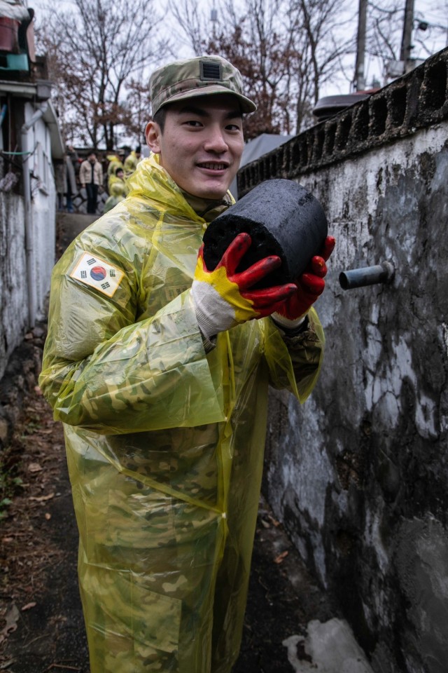 Camp Casey U.S. Soldiers deliver coal briquettes to underprivileged neighborhoods in the city of Uijeongbu