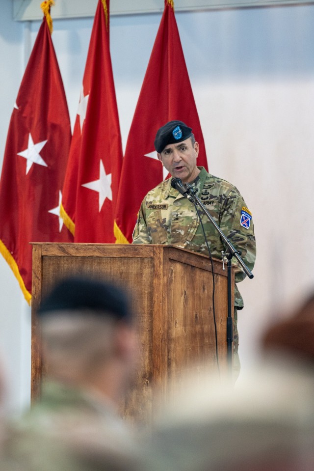 Maj. Gen. Gregory K. Anderson, commander of the 10th Mountain Division, "Task Force Mountain", provides remarks during the transfer of authority ceremony, between TF Mountain and the 82nd Airborne Division, "Task Force 82", hosted by the U.S. Army’s V Corps, at Mihail Kogalniceanu Air Base, Romania, Dec. 15. The soldiers and paratroopers assigned to TF 82 support the U.S. Army V Corps’ mission to reinforce NATO’s eastern flank, assure European allies and partners, and deter aggression. (U.S. Army Photo by Sgt. 1st Class Jonathan Hornby).