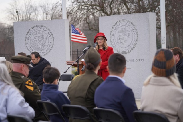 Karen Straffon, who organized the Clinton Township, Michigan Wreaths Across America event, speaks to a crowd of several hundred attendees.