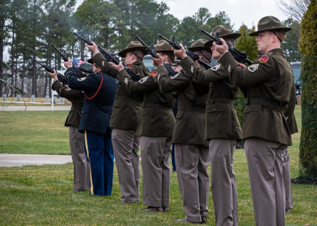 Soldiers with 3rd Chemical Brigade perform a three-volley salute, also known as a 21-gun salute, during a Wreaths Across America ceremony Saturday at the Missouri State Veterans Cemetery - Fort Leonard Wood.