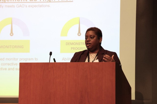 Ms. Natasha Anderson, Director, Financial Operations & Accounting, OASA (FM&C), provides background on the Army Audit during the 2023 Army Annual Audit Summit in Washington Dec. 13, 2023.