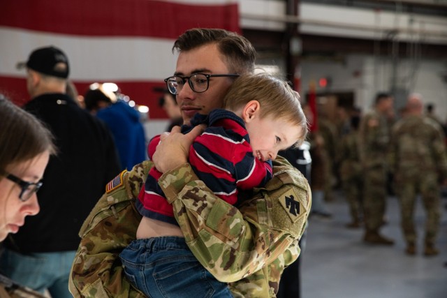 Loved ones gathered alongside nearly 50 Oklahoma Army National Guardsmen during a deployment ceremony Dec. 30, 2023, at the Army Aviation Support Facility 2 in Tulsa, Oklahoma. Members of Charlie Company, 1st Battalion (Assault Helicopter Battalion), 244th Aviation Regiment, 90th Troop Command, will deploy to Kosovo to support Operation Joint Guardian (KFOR).