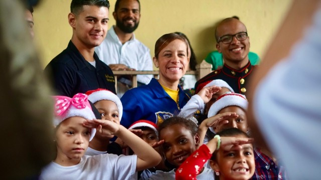 Puerto Rican Officer of the Blue Angels Transforms Her Childhood Hardships into Christmas Smiles for Less Fortunate Children of the Island