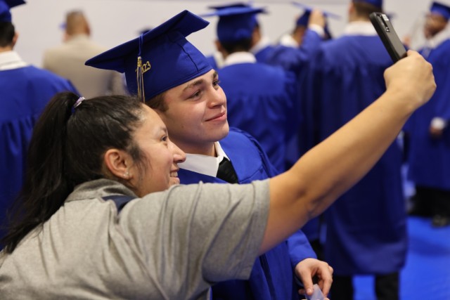 Cadets graduate from the Washington Youth ChalleNGe Academy in a ceremony at Tacoma Community College Dec. 15, 2023. The WYCA is a disciplined, quasi-military academy to empower at-risk youth to improve their education levels and employment...