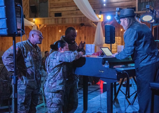 Service members enjoyed dueling pianos Dec. 29 during the Waynesville and St. Robert area’s Salute to the Season event for those who chose to remain at Fort Leonard Wood during Holiday Block Leave.