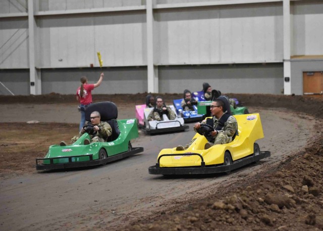 Service members who chose to remain at Fort Leonard Wood during Holiday Block Leave participate in go karting during an event Dec. 20 in Lebanon, Missouri.