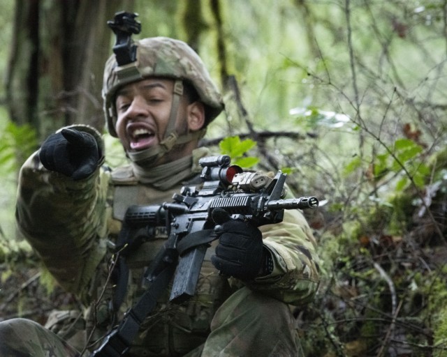 Washington National Guard Soldiers with Bravo Company, 3rd Battalion, 161st Infantry Regiment, 81st Stryker Brigade Combat Team, react to contact during squad training on Joint Base Lewis-McChord Jan. 6, 2024. By practicing excellence in the...