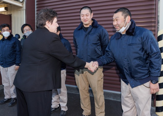 Brenda Lee McCullough, director of U.S. Army Installation Management Command–Pacific, shakes hands with U.S. Army Garrison Japan employees during her first official visit to Camp Zama, Japan, Jan. 8, 2024. McCullough received several briefings while visiting garrison assets, including housing units, support facilities and other infrastructure. 