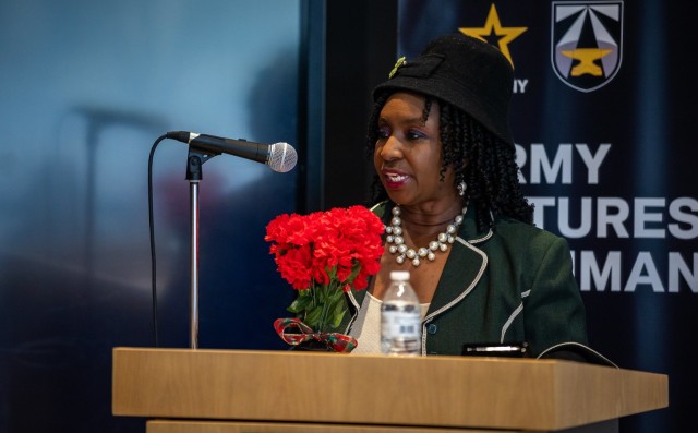 Department of the Army Civilian Joycelyn Taylor recites an excerpt from Coretta Scott King’s autobiography during the Army Futures Command Martin Luther King Jr. Day observance in Austin, Texas.