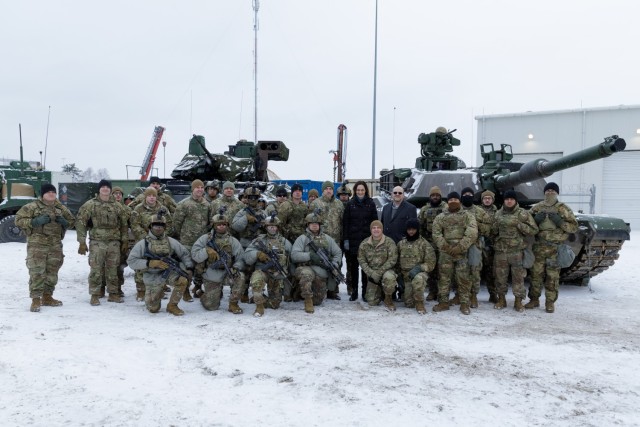 U.S. Army Soldiers with  3rd Battalion, 67th Armored Regiment, 2nd Armored Brigade Combat Team, 3rd Infantry Division, join Lithuanian Speaker of Parliament Viktorija Čmilytė-Nielsen during a tour of Camp Herkus, Lithuania Jan. 4. 2024. The 3rd Infantry Division’s mission in Europe is to engage in multinational training and exercises across the continent, working alongside NATO Allies and regional security partners to provide combat-credible forces to V Corps, America’s forward deployed corps in Europe. (U.S. Army photo by Staff Sgt. Oscar Gollaz)