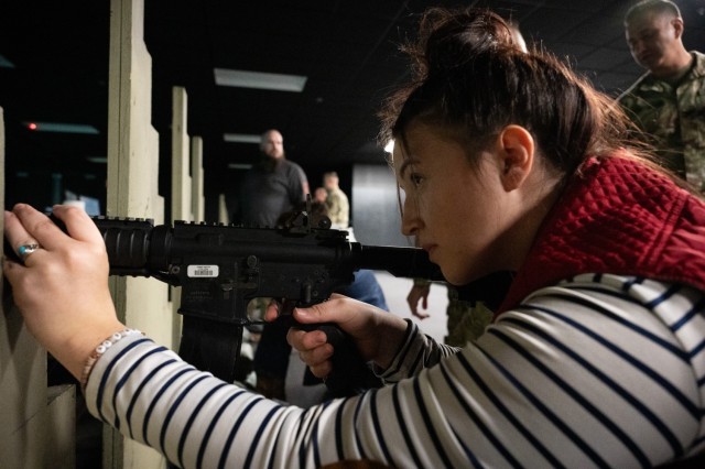Kyah Rutledge, a Summersville High School student, takes aim at the targets on the screen of the M4 rifle Engagement Skills Trainer located in Bldg. 729, during a field trip to Fort Leonard Wood on Jan. 8.