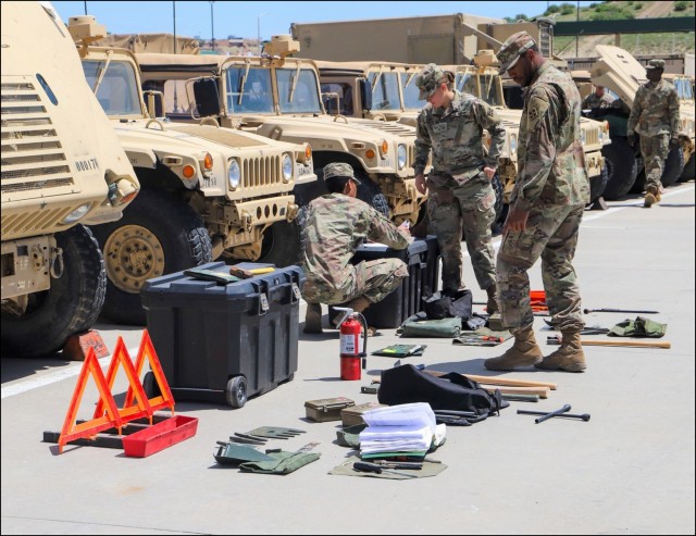 4th Sustainment Brigade Soldiers conduct component parts inventories of HMMWVs 