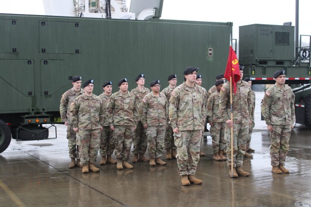 U.S. Army Soldiers from Delta Battery, 5th Battalion, 3rd Field Artillery Regiment, 1st Multi-Domain Task Force stand in formation behind a Mid-Range Capability (MRC) Launcher at Joint Base Lewis-McChord, Washington, January 10, 2024. Delta Battery is the second battery activated as part of the 1st Long-Range Fires Battalion in support of Multi-Domain Operations. The MRC Launcher can fire the Standard Missile 6 (SM-6) and Tomahawk Land Attack Missile (TLAM).  These missiles allow the Army to prosecute maritime and land targets in support of multi-domain operations. (U.S. Army photo by Caitlyn Davies)