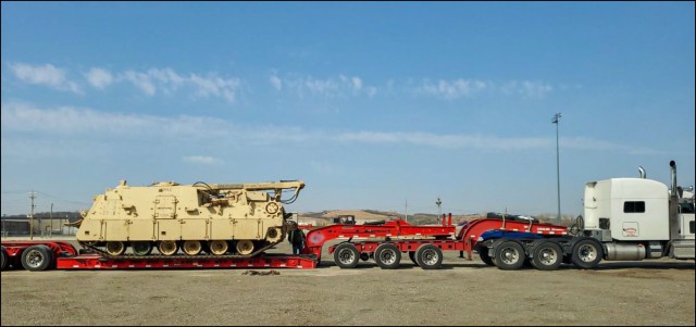 M88A2 recovery vehicle being loaded for shipment to Anniston Army Depot at the Fort Riley MDRS site 