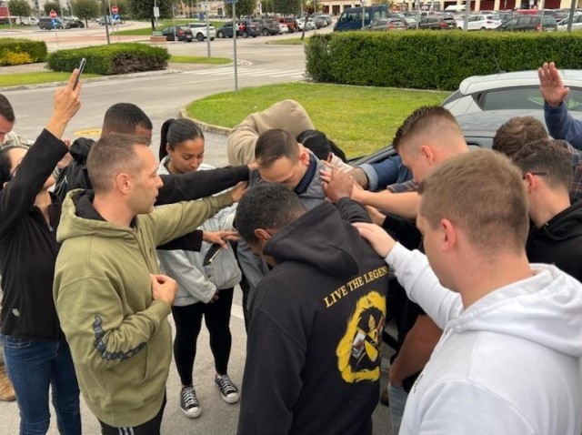 Cpt. Michael Coats, Allied Forces South Battalion chaplain, prays for a deploying Soldier assigned to the 2nd NATO Signal Battalion’s Deployable CIS Module-A. DCM-A based in Grazzanise, Italy, regularly supports NATO operations in deployed areas...